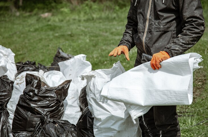 A man is cleaning and removing the Junk